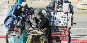 USA, California, San Francisco, Homeless man with all possession on bicycle